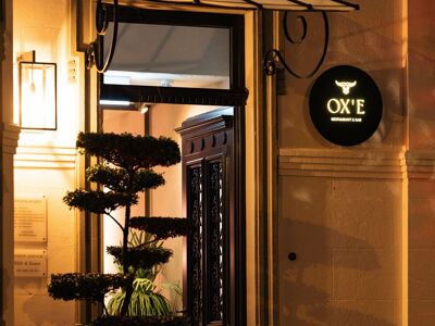 OX'E