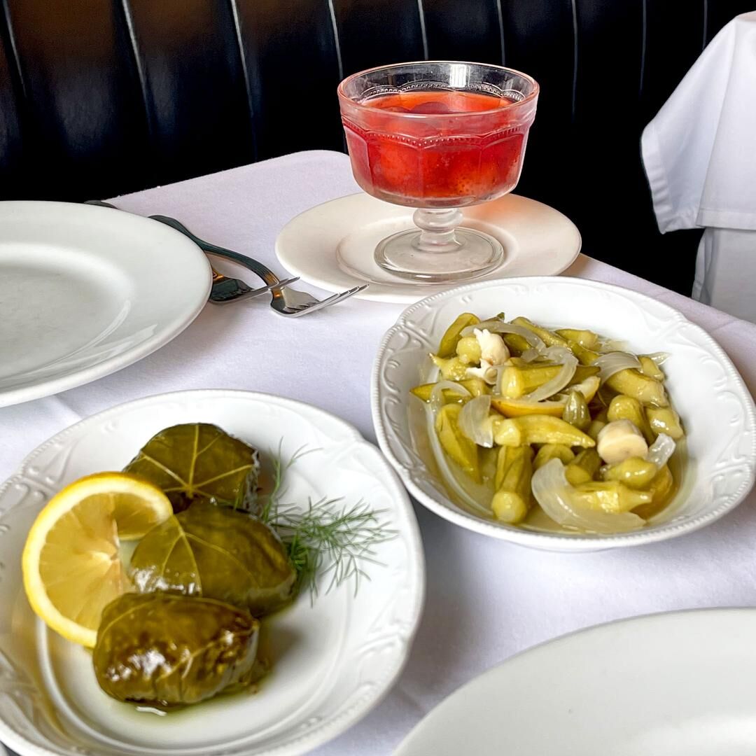 Image // Tuba Şatana / Michelin // Compote with seasonal fruit, okra braised in olive oil, rice stuffed vine leaves 